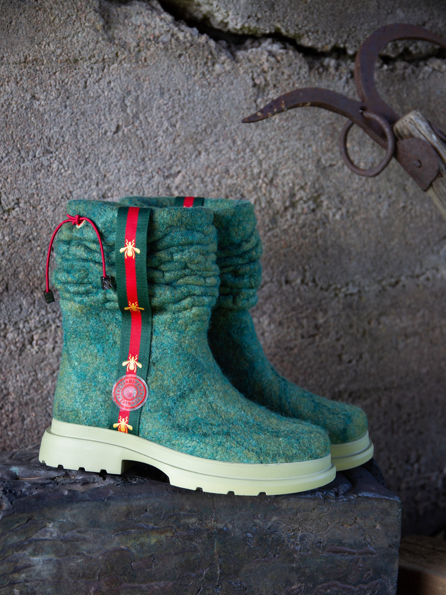 Felted boots in turqoise and sturdy soles.